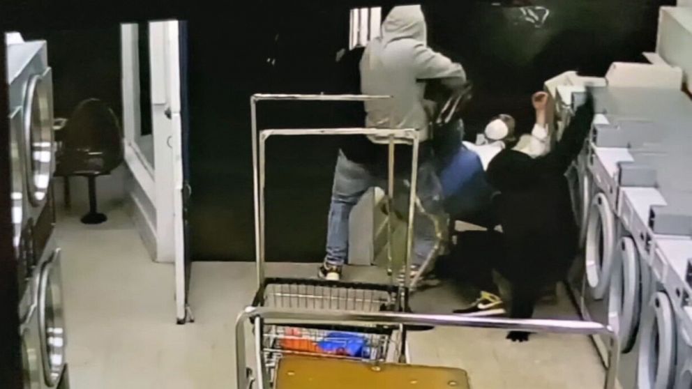 PHOTO: This still grab from video shows a violent attack and robbery of an elderly Asian man in a laundromat in the Nob Hill/Chinatown area of San Francisco on Feb 23, 2021 which is being investigated by police.