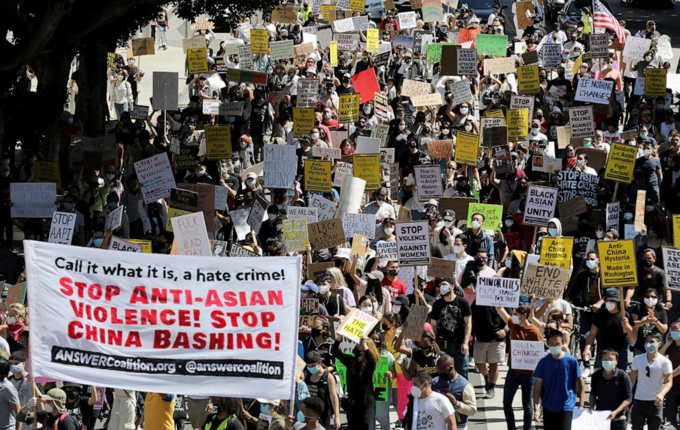 PHOTO: People march against anti-Asian violence and racism on March 27, 2021, in Los Angeles.