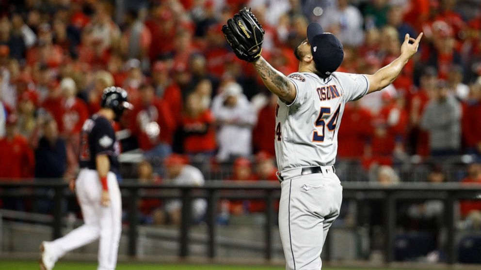 PHOTO: Houston Astros relief pitcher Roberto Osuna celebrates their teams win against the Washington Nationals in Game 3 of the baseball World Series Saturday, Oct. 26, 2019, in Washington. The Astros won 4-1. 