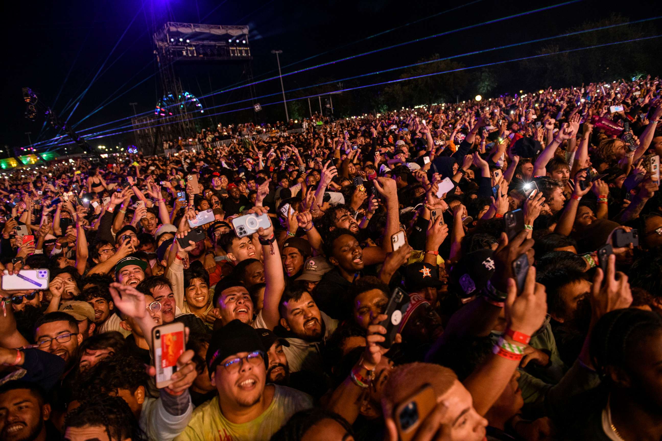 PHOTO: The crowd watches as Travis Scott performs at Astroworld Festival, Nov. 5, 2021, in Houston. 