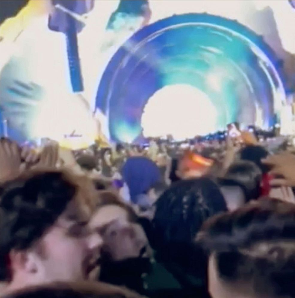 PHOTO: This still image taken from a cell phone video shows fans attending a performance by rapper Travis Scott, shout to people to "back up" during the Astroworld music festival in Hoston, Nov. 5, 2021.  