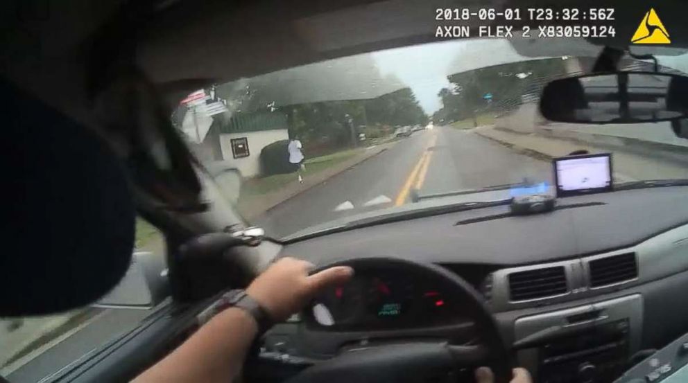 Timmy Patmon, top left, is seen running from a police cruiser driven by officer Taylor Saulters. Saulters has been fired by the Athens-Clarke County Police Department in Georgia for hitting Patmon.