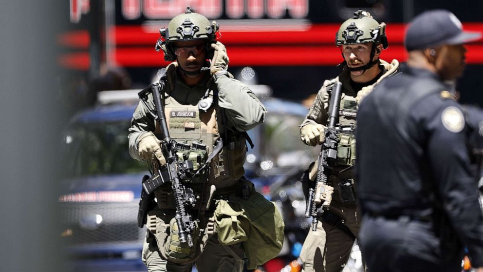 PHOTO: Police officers work at the scene of a shooting inside the Northside Family Medicine and Urgent Care in downtown Atlanta, May 3, 2023.