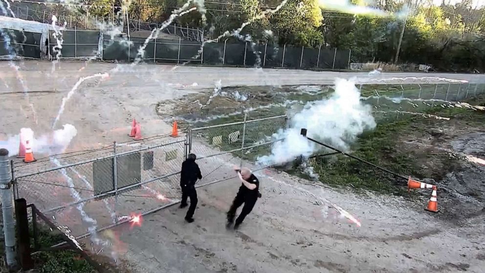 PHOTO: Protesters launch fireworks against members of the police at the construction site of a police training center, after a demonstration at the property led to clashes, in Atlanta, March 5, 2023, in a still from a social media video.