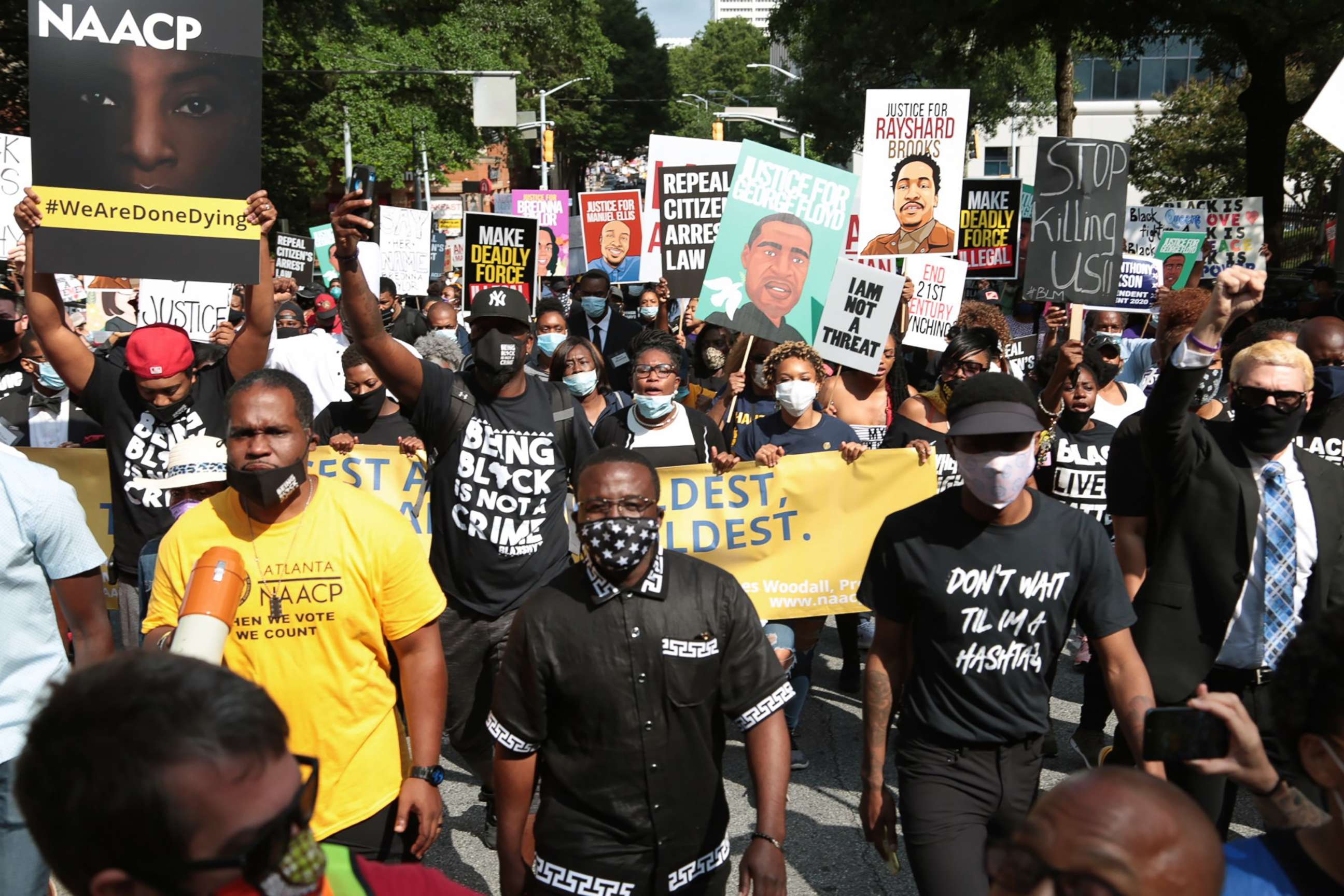 PHOTO: People gather for a civil rights National Association for the Advancement of Colored People (NAACP) protest march, June 15, 2020 in Atlanta.