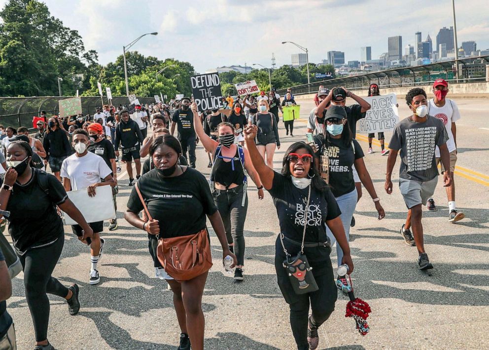 PHOTO: Protesters march from Atlanta Police Department headquarters to a Wendy's, nearly 4 miles away, June 14, 2020, in Atlanta.