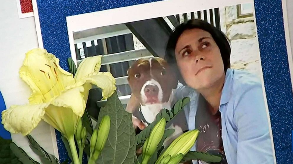 PHOTO: A photo of Katie Janness and her dog Bowie is displayed as part of a memorial in Piedmont Park in Atlanta, Ga., July 30, 2021. 