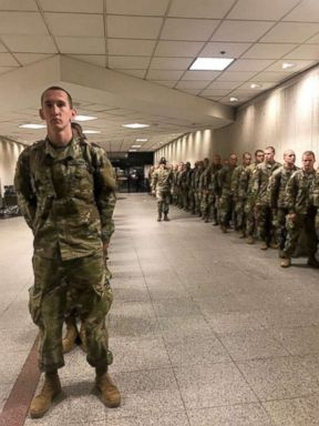 PHOTO: Accompanied by their drill instructors Army recruits from Fort Benning, Georgia arrive at Atlantas Hartsfield-Jackson International Airport headed home for the holidays.