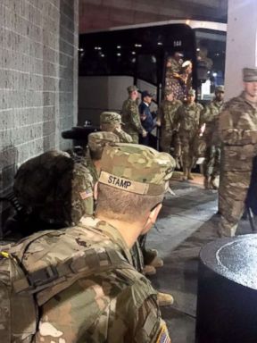 PHOTO: Accompanied by their drill instructors Army recruits from Fort Benning, Georgia arrive at Atlantas Hartsfield-Jackson International Airport headed home for the holidays.