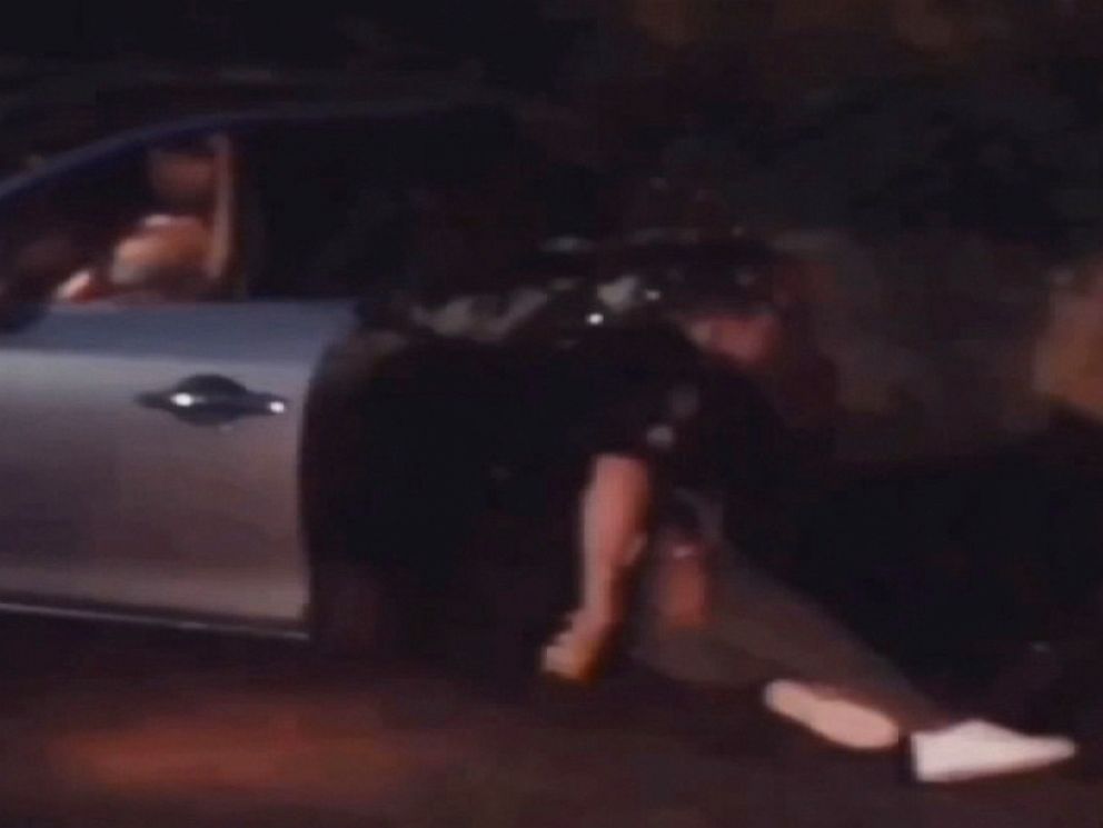 PHOTO: A cell phone video taken May 1, 2019, shows an Atlanta Police officer allegedly pulling Maggie Thomas from her car, slamming her to the ground and using a stun gun on her.
