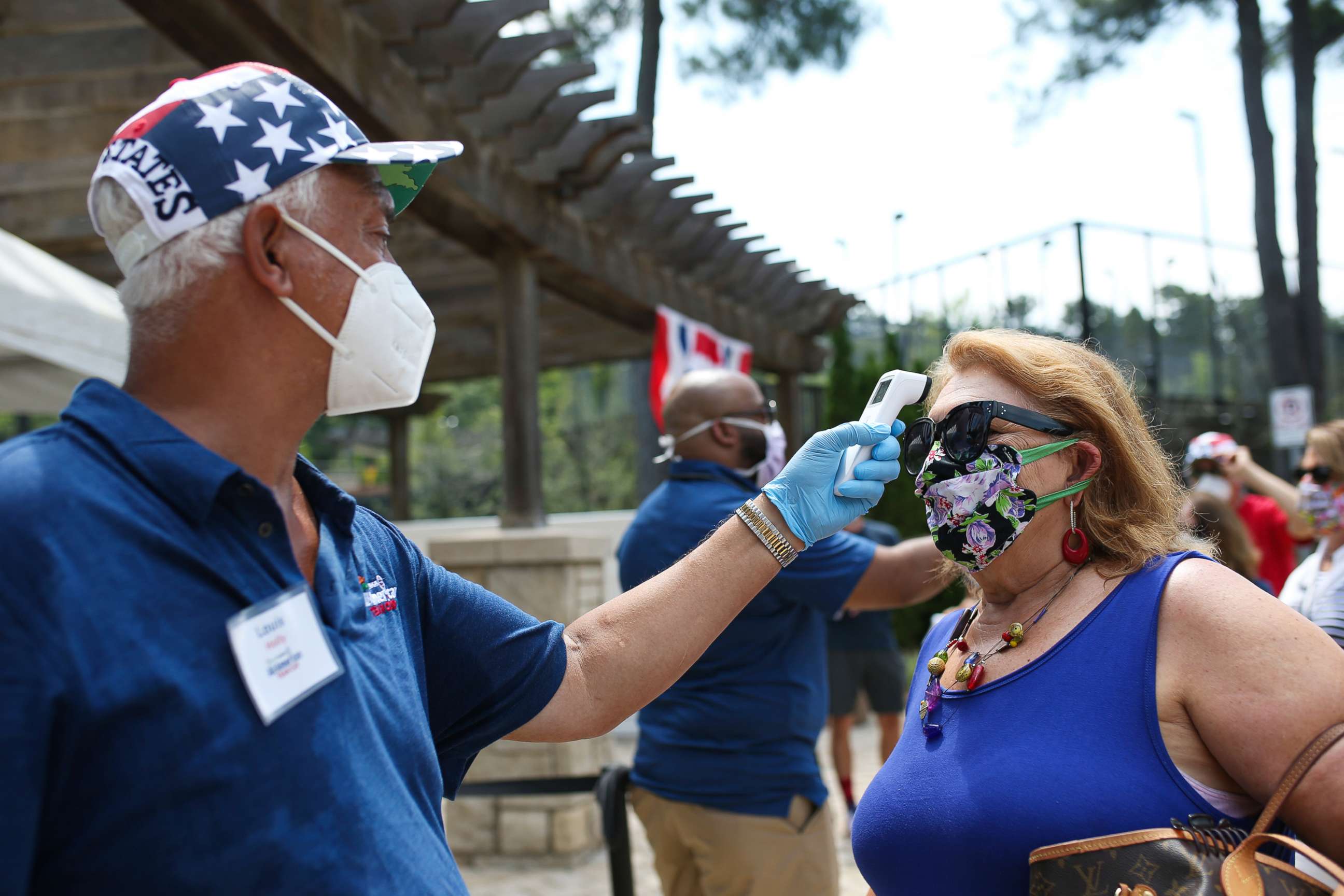 PHOTO: Fans have their temperature screened prior to entering the DraftKings All-American Team Cup on July 4, 2020, in Atlanta.