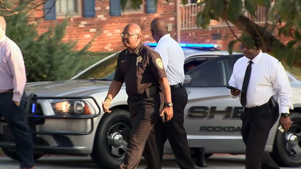 PHOTO: Investigators are pictured outside the scene where a homeowner shot and killed three men who were wearing masks early Monday morning on Sept. 16, 2019, in Rockdale County, Ga.