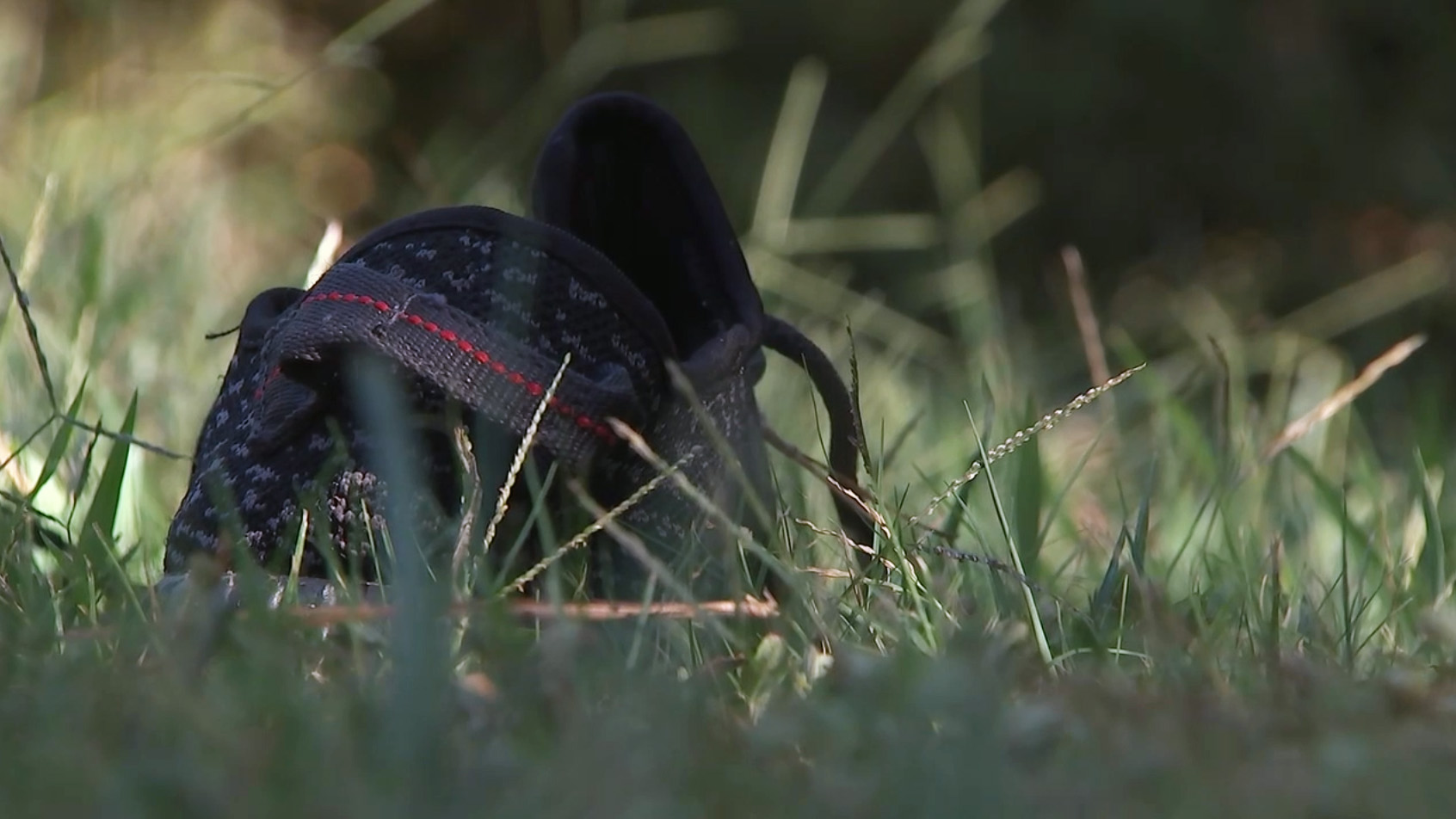 PHOTO: A lost shoe is pictured outside the scene where a homeowner shot and killed three men who were wearing masks early Monday morning on Sept. 16, 2019, in Rockdale County, Ga.