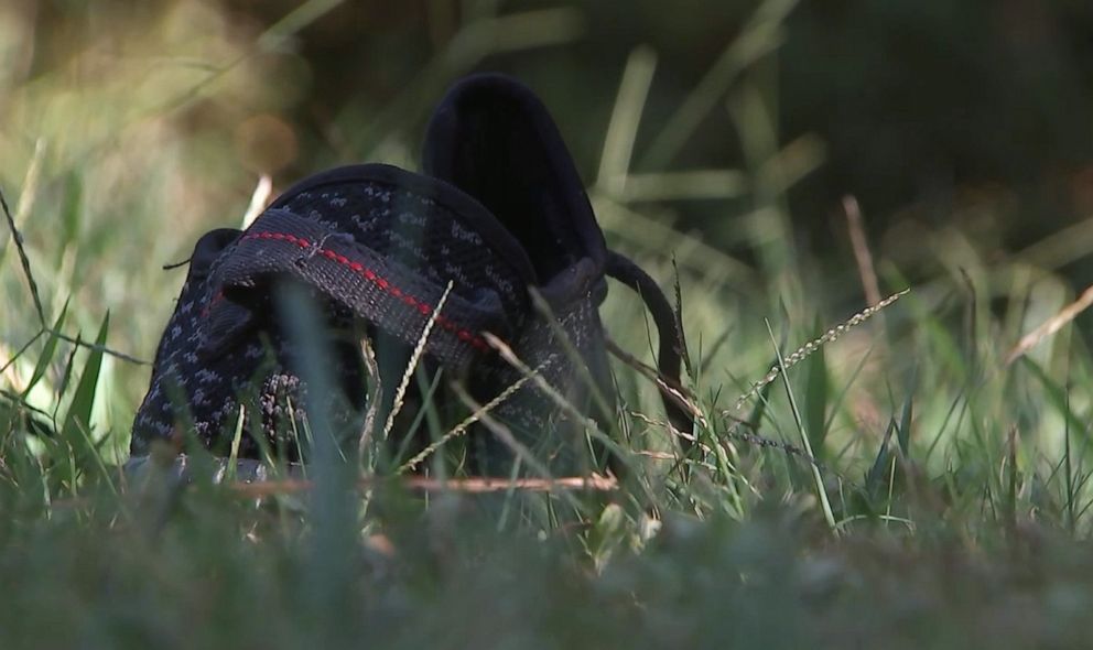 PHOTO: A lost shoe is photographed on the outside of the stage. A landowner shot and killed three men wearing masks early Monday morning September 16, 2019 in Rockdale County, Georgia.