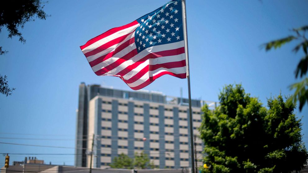 PHOTO: An American flag flies in front of the Atlanta VA Medical Center in Atlanta, May 24, 2013.