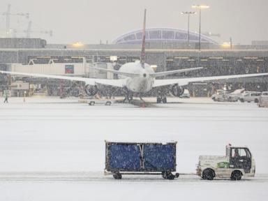 Passengers evacuate plane on slides after Delta flight aborts takeoff