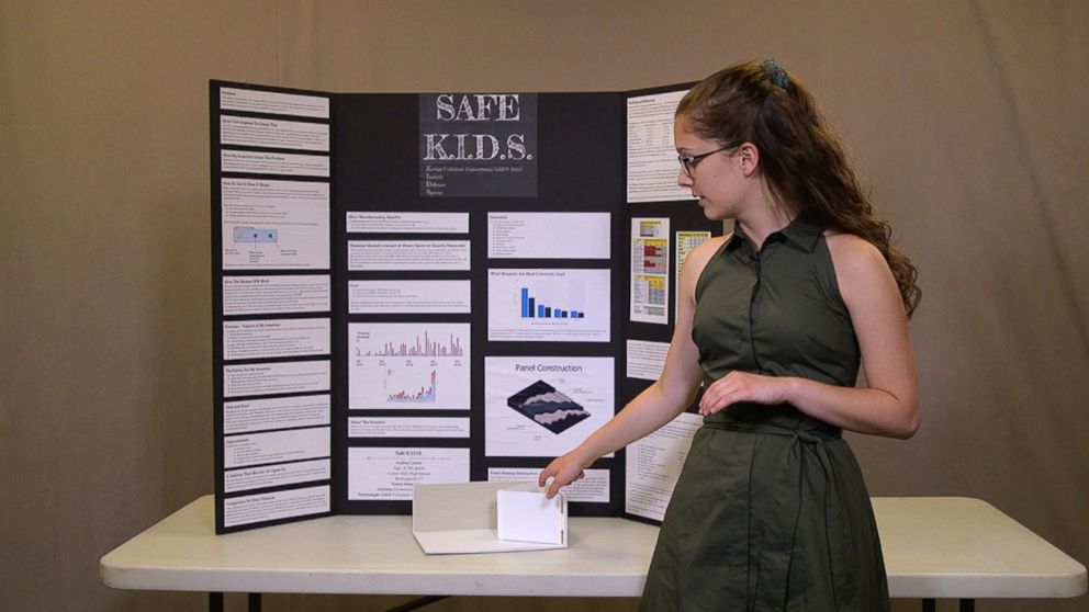 PHOTO: Audrey Larson, 14, is pictured on July 31, 2018, with her invention idea on how to keep schools safe during a school shooting.