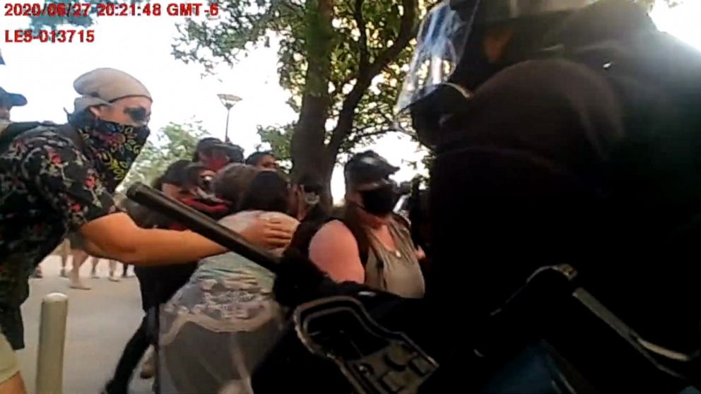 PHOTO: An image made from body camera footage released by the Aurora Police Department in Colorado, shows clashes between police and protesters on June 27, 2020.