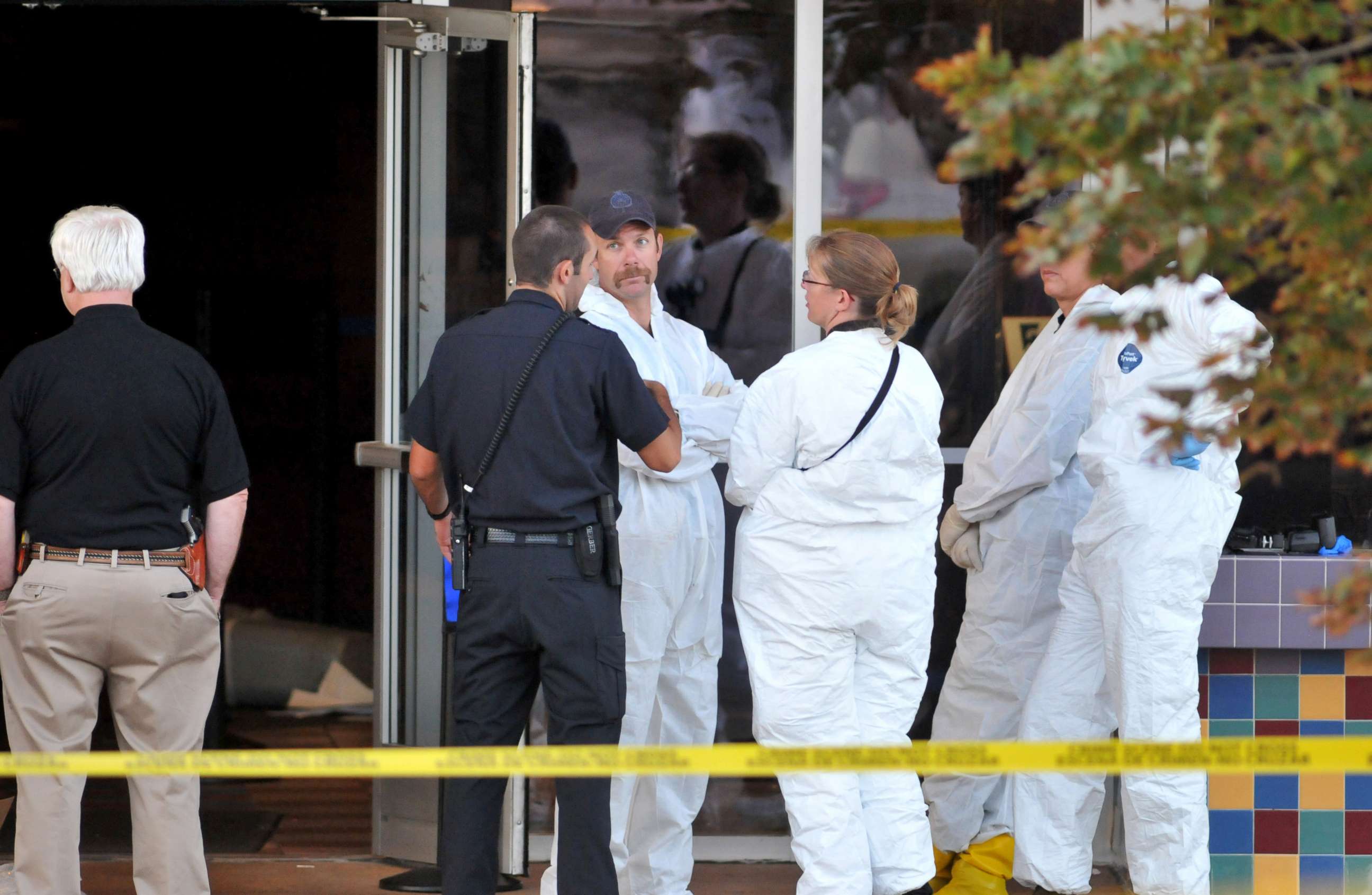 PHOTO: Investigators are on the scene at the Century 16 movie theatre where a gunmen attacked movie goers during an early morning screening of "The Dark Knight Rises," July 20, 2012, in Aurora, Colorado.