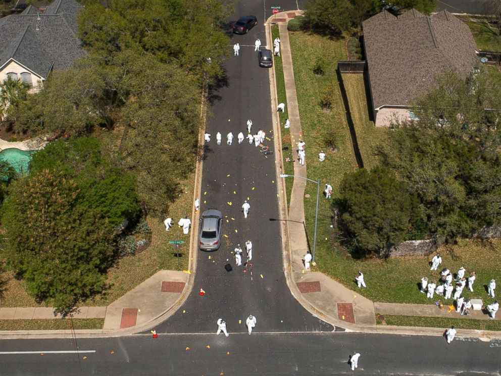 PHOTO: Investigators work at the scene of a bomb explosion on Dawn Song Drive in Austin, Texas, March 19, 2018.