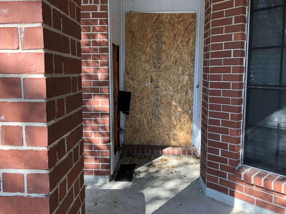 PHOTO: The doorway of a home where a fatal parcel bomb exploded on March 2, 2018, is seen boarded-up in Austin, Texas, March 12, 2018.