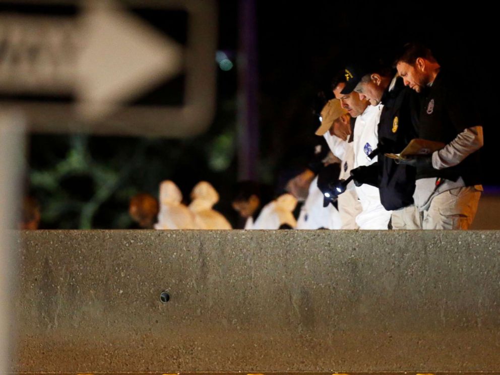 PHOTO: Police collect evidence after the bombing suspect blew himself up after being confronted by police in Round Rock, Texas, March 21, 2018.