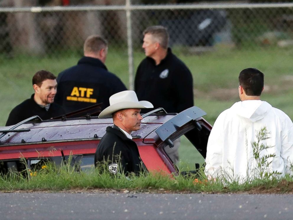 PHOTO: Officials investigate the scene where a suspect in a series of bombing attacks in Austin blew himself up as authorities closed in, March 21, 2018, in Round Rock, Texas.