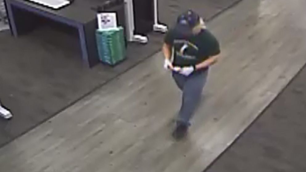 PHOTO: An image made from security camera footage appears to show a man identified by authorities as Austin bombing suspect Mark Conditt shipping two packages at a FedEx store on March 18, 2018.