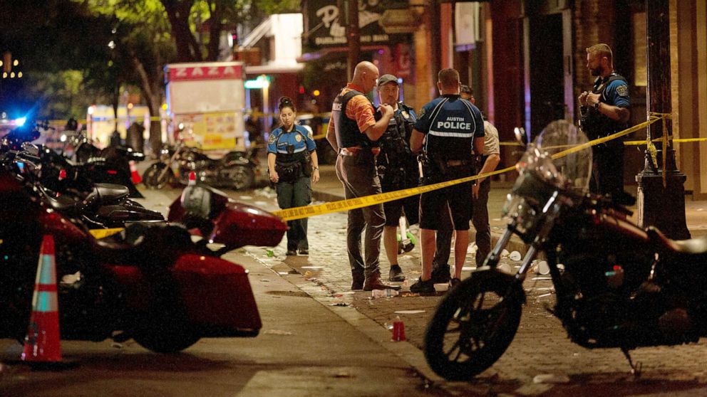 PHOTO: Police investigate the scene of a mass shooting in the Sixth Street entertainment district area of Austin, Texas, June 12, 2021.