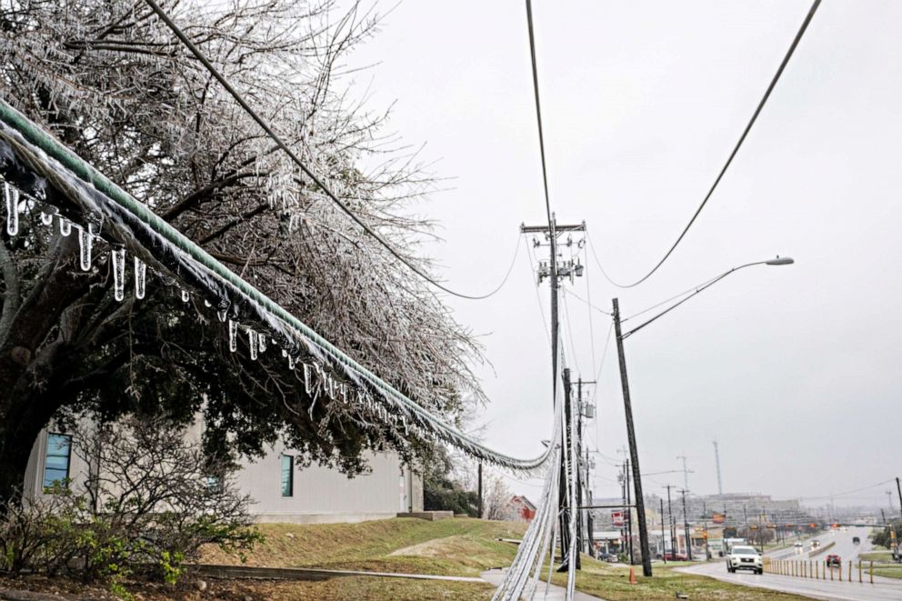 PHOTO: Frozen power lines are seen hanging near a sidewalk on Feb. 01, 2023 in Austin, Texas.