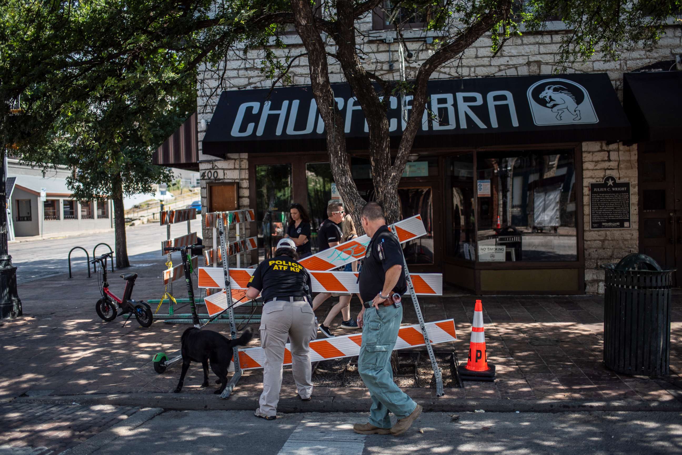 PHOTO: An ATF K9 unit surveys the area near the scene of a shooting on June 12, 2021 in Austin, Texas.