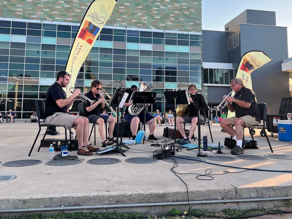 PHOTO: The Austin Symphony Orchestra (ASO) Brass Quintet performs on the Long Center Terrace, June 5, 2022, in Austin, Texas.