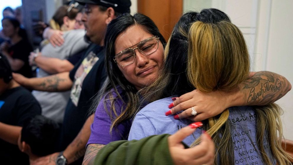 PHOTO: Family members of the victims of the Uvalde shootings react after a Texas House committee voted to take up a bill to limit the age for purchasing AR-15 style weapons in the full House in Austin, Texas, May 8, 2023.