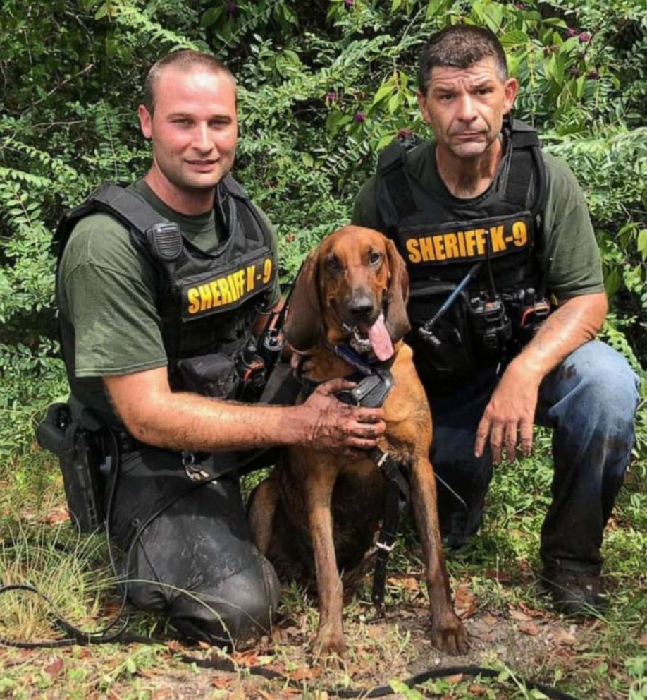 PHOTO: Officers posing with blood hound.