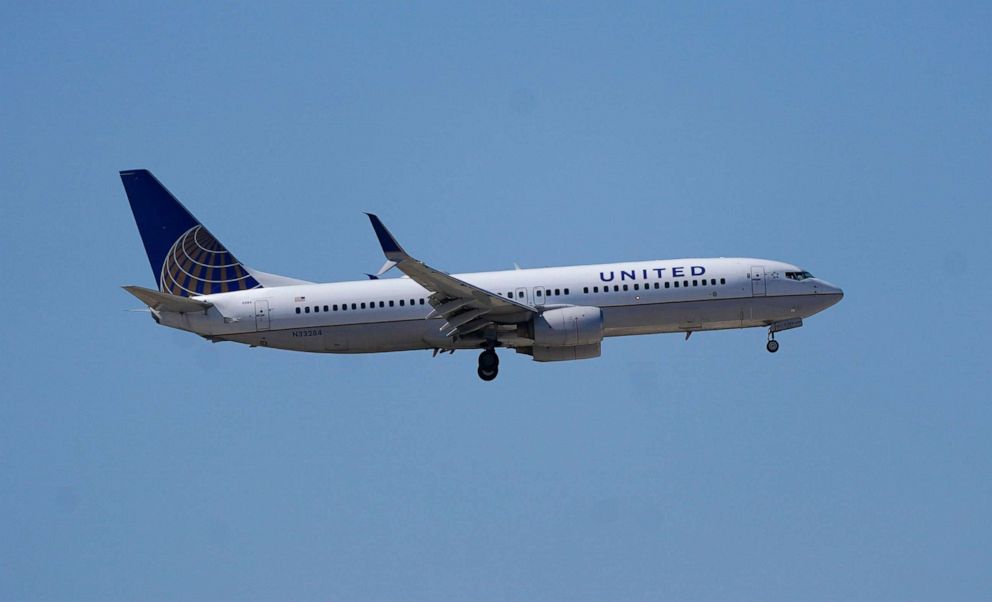 PHOTO: A United Airlines jetliner drops its landing gear for arrrival at Denver International Airport, Oct. 1, 2020,