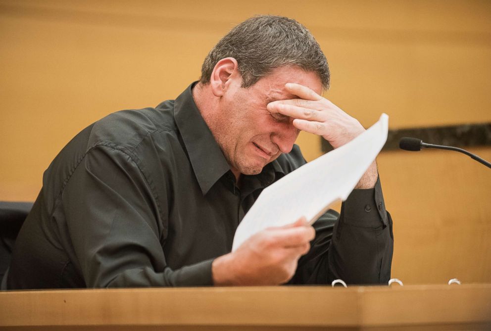 PHOTO: John Avitto becomes tearful while apologizing to John Guica for what he claims was false testimony, at Justice Chun's temporary courtroom in the Kings County Supreme Court in downtown Brooklyn, New York, Nov. 16, 2015.