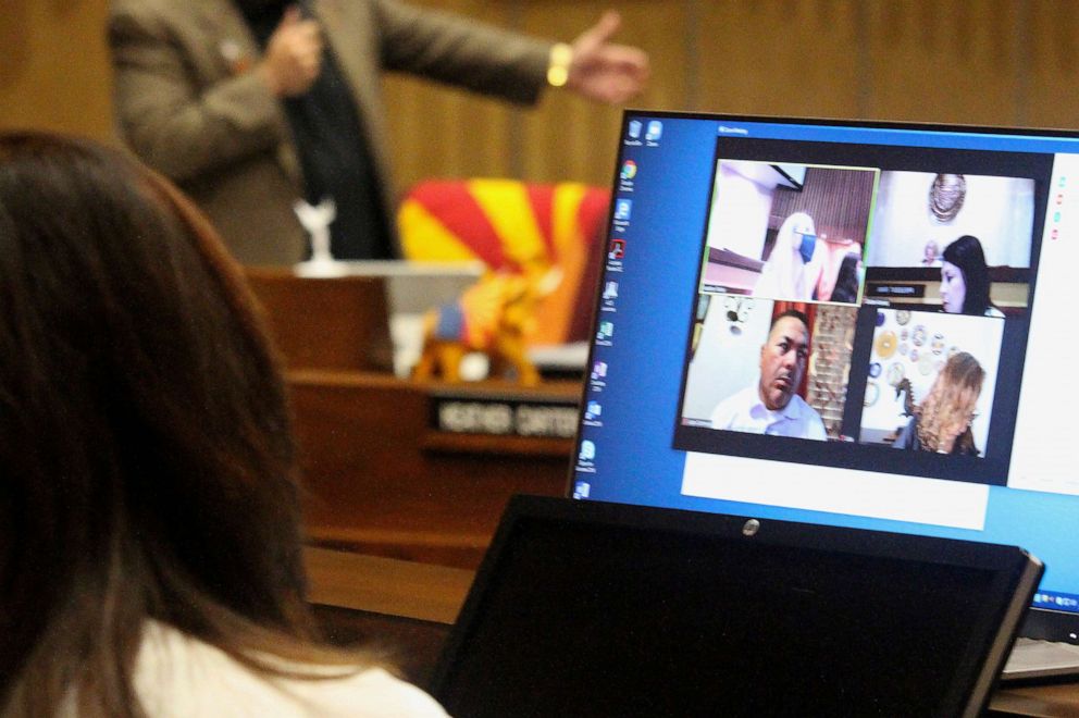 PHOTO: Arizona state senators who were attending a session via teleconference are shown on a computer screen at the state Capitol in Phoenix, May 8, 2020.