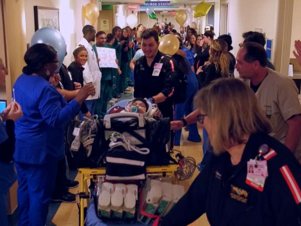 PHOTO: Staff celebrates as Jacob Rodriguez leaves the Dallas hospital Medical City Dallas after spending 685 in the hospital, Jan. 22, 2019.