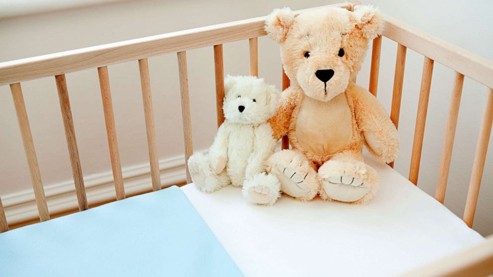 PHOTO: Stock photo of a baby's crib with stuffed plush toys.