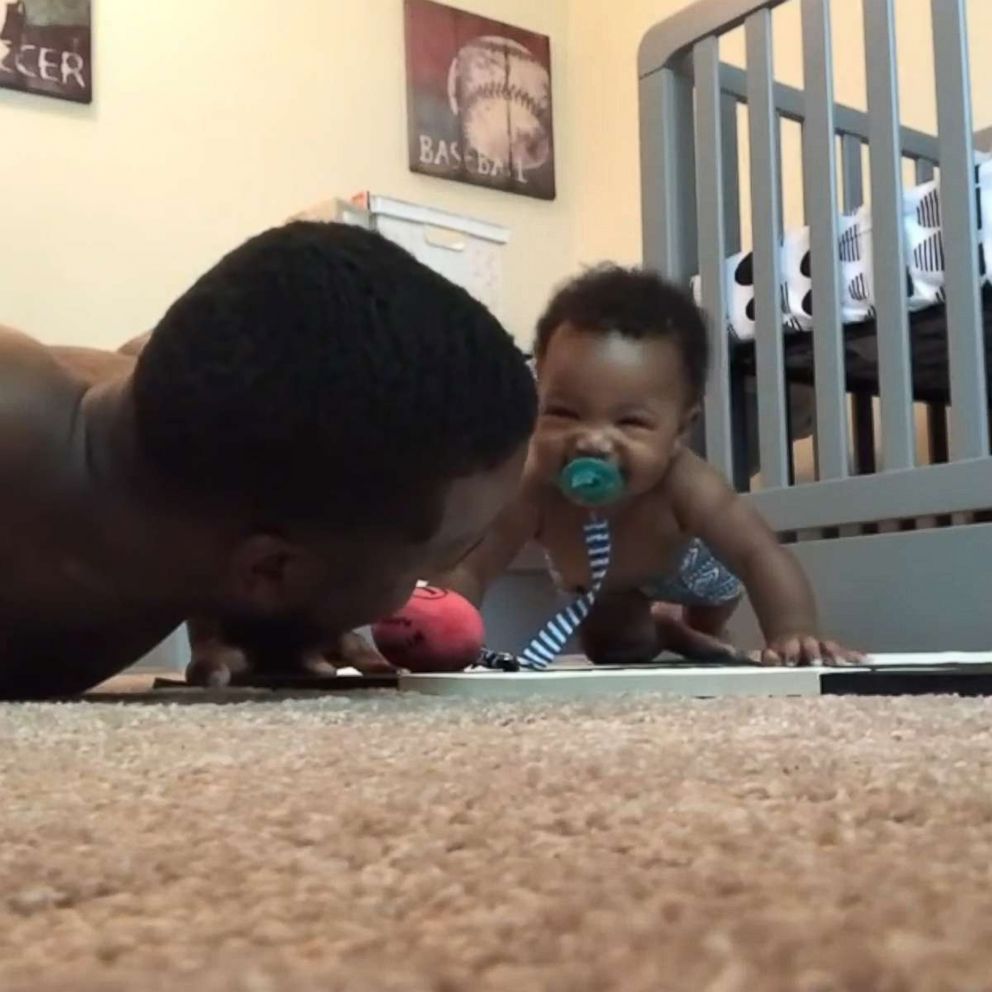 VIDEO: Adorable baby does push-ups with his dad