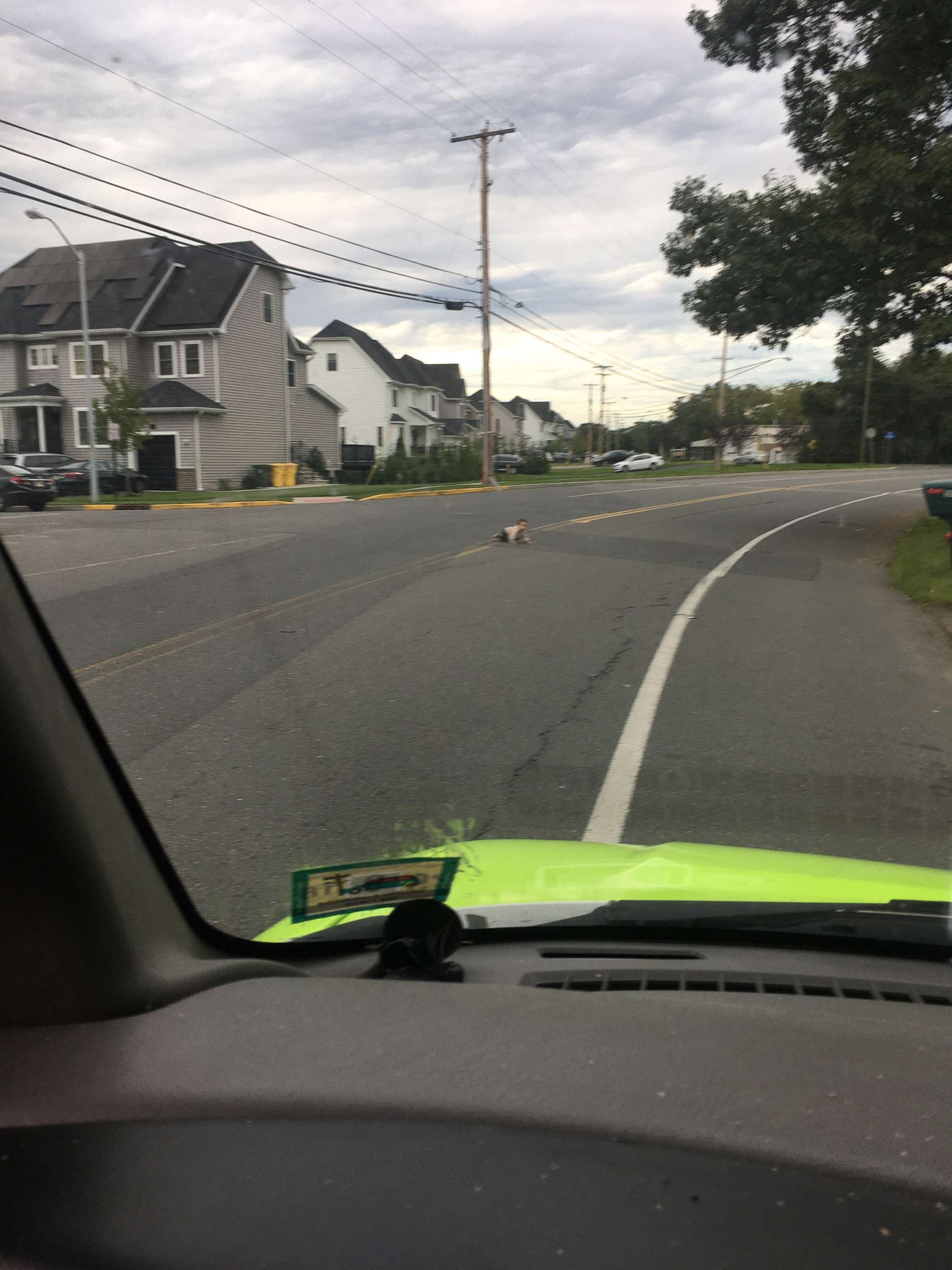 PHOTO: A baby crawls across Joe Parker Road in Lakewood Township, N.J., in a photo taken by a passing motorist who stopped to move the child off of the street, Sept. 22, 2018.