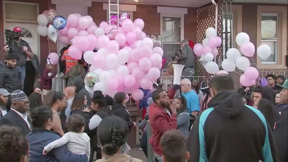 PHOTO: People gather during a vigil on Oct. 21, 2019, for a two-year old girl who was killed in Philadelphia over the weekend.