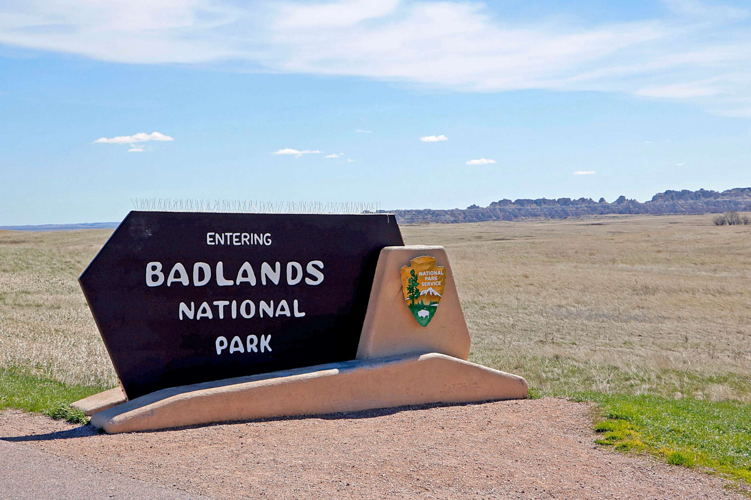 PHOTO: A sign indicates the entrance to Badlands National Park in South Dakota.