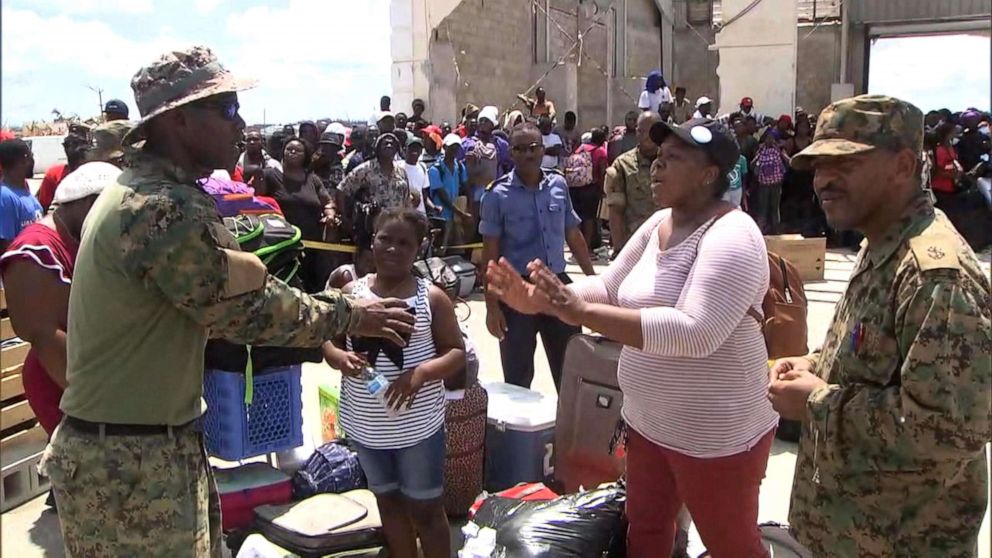 PHOTO: Rymrih Nairn, a mother of three, pleads with military officials for help in getting evacuated from the Abaco Islands in the Bahamas. 