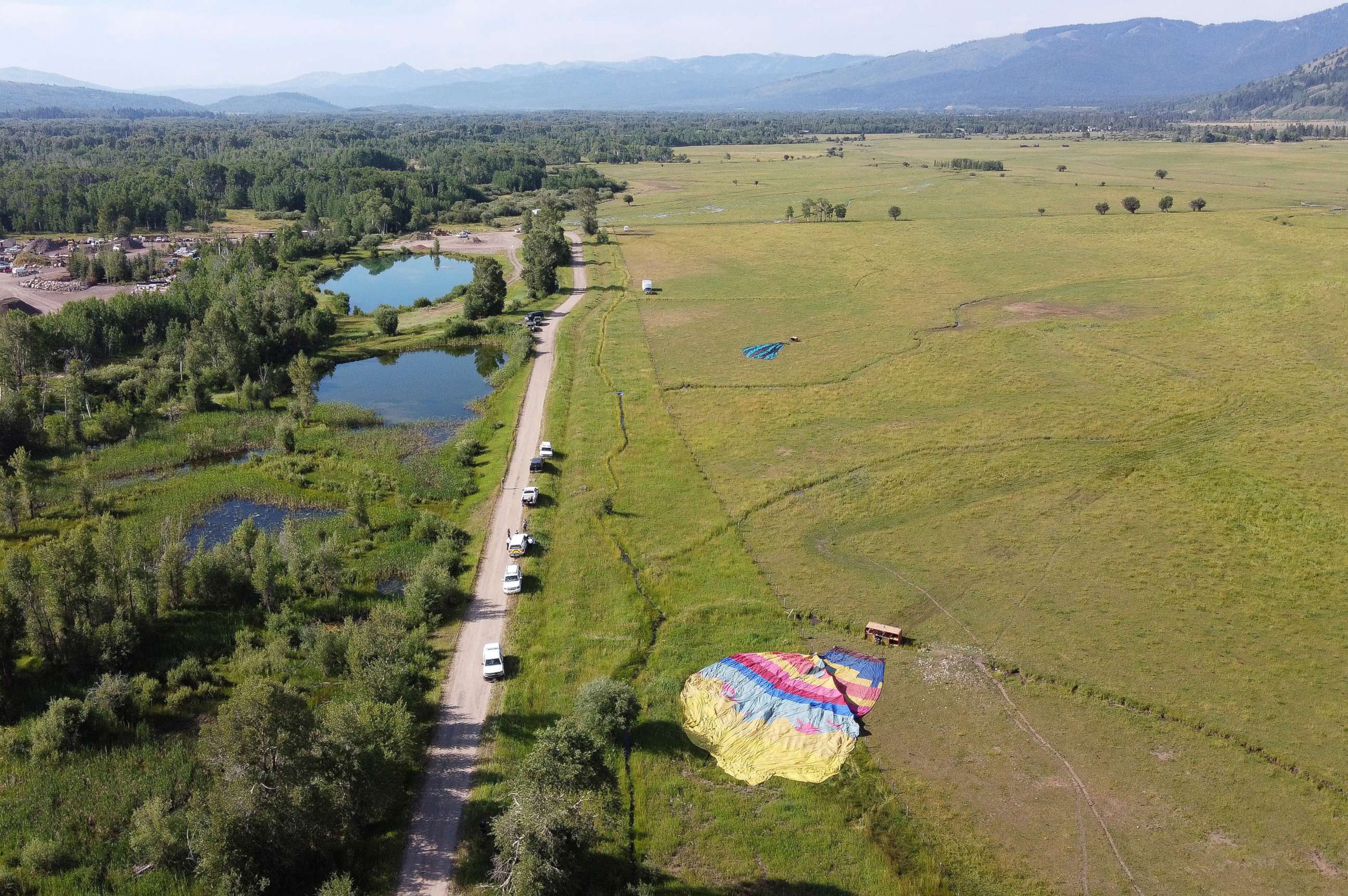 PHOTO: Two of three sightseeing balloons that crashed Monday, Aug. 3, 2020, are seen in an open area of Jackson Hole in western Wyoming.