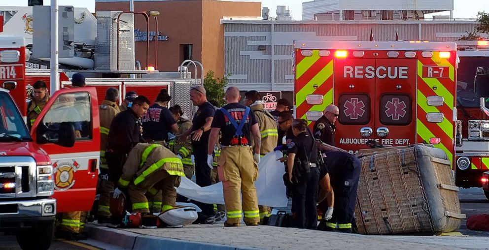 PHOTO: Albuquerque Fire Rescue Personnel work at the scene of a fatal Balloon crash in Albuquerque, June 26, 2021.