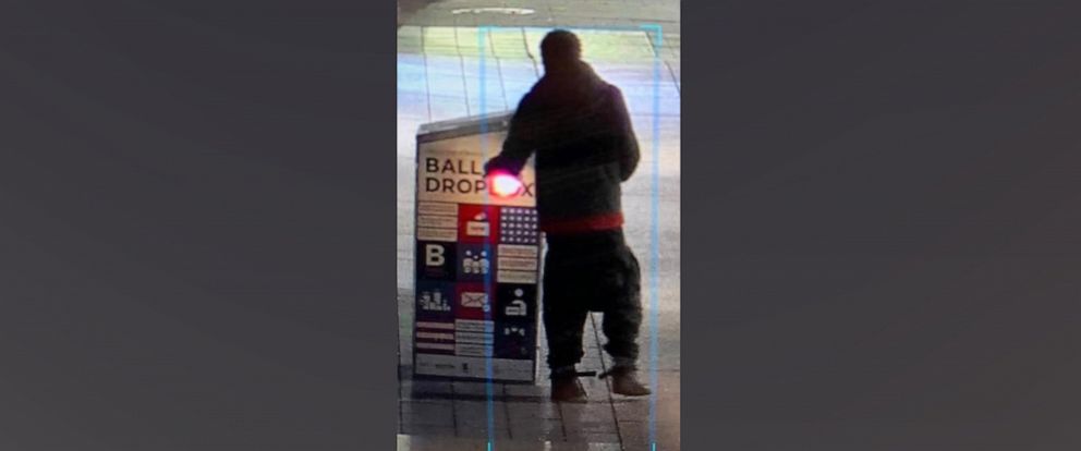 PHOTO: Worldly Armand sets fire to a ballot box in this surveillance image released by the Boston Police Department.