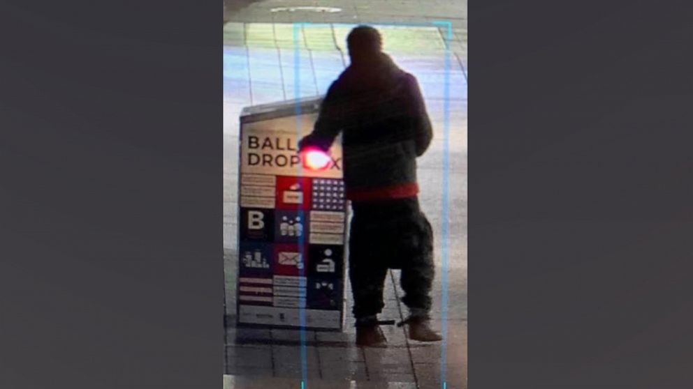 PHOTO: Worldly Armand sets fire to a ballot box in this surveillance image released by the Boston Police Department.