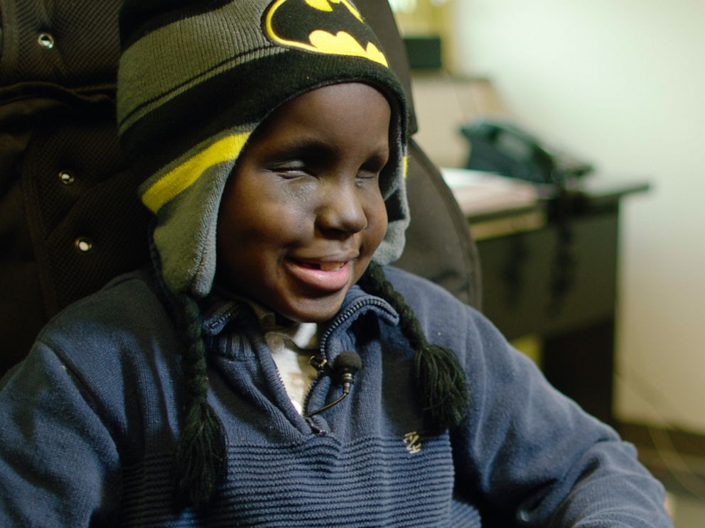 PHOTO: Ravens head coach John Harbaugh invited Mo Gaba, 13, to be the first person to read an NFL draft pick in Braille on Saturday, April 27, 2019, in Baltimore.