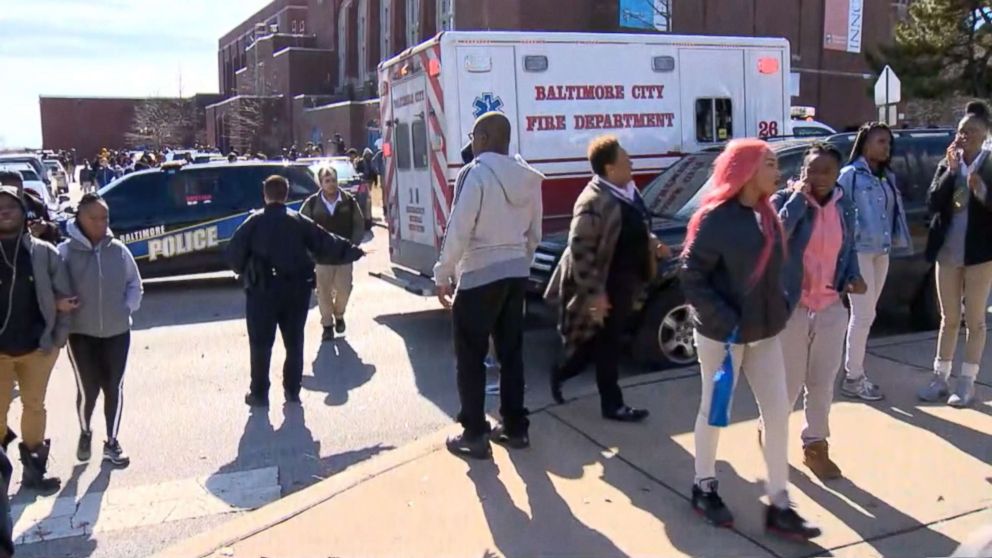 PHOTO: People exit Frederick Douglass High School in Baltimore after reports of a shooting, Feb. 8, 2019.